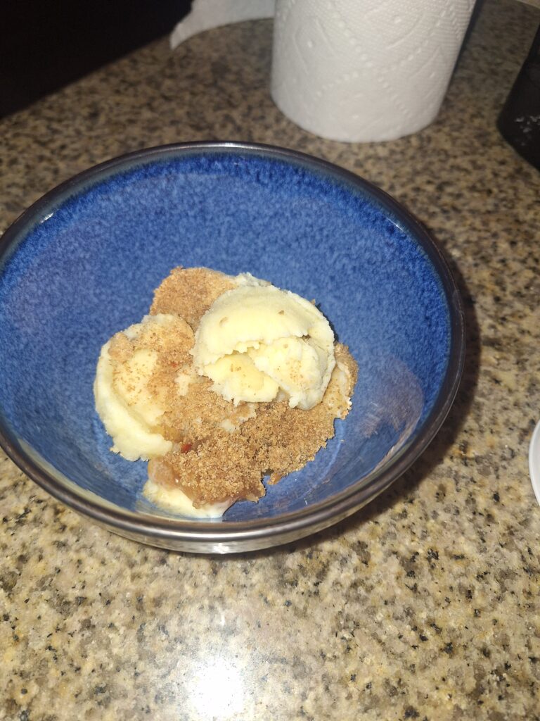 Cheesecake Ice Cream with Sheri's Apricot Habanero Jelly and graham cracker crumbs.